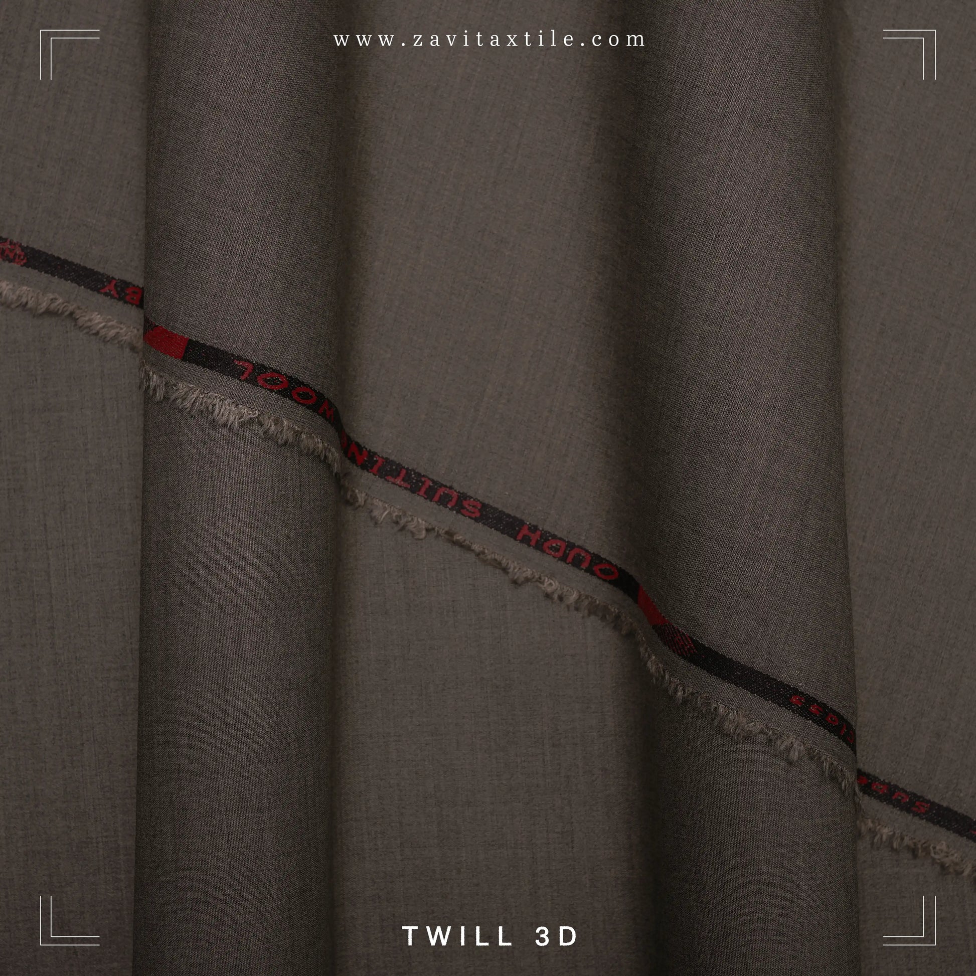 Gray fabric with a red and black pattern along the edge, branded 'Zavita Textile'.